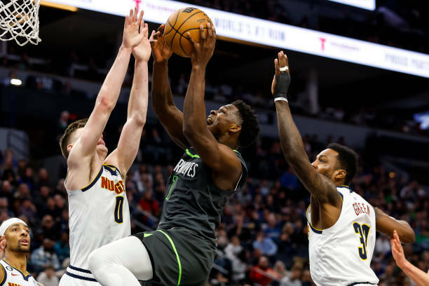 Timberwolves win 128-98 against Jokic-less Nuggets