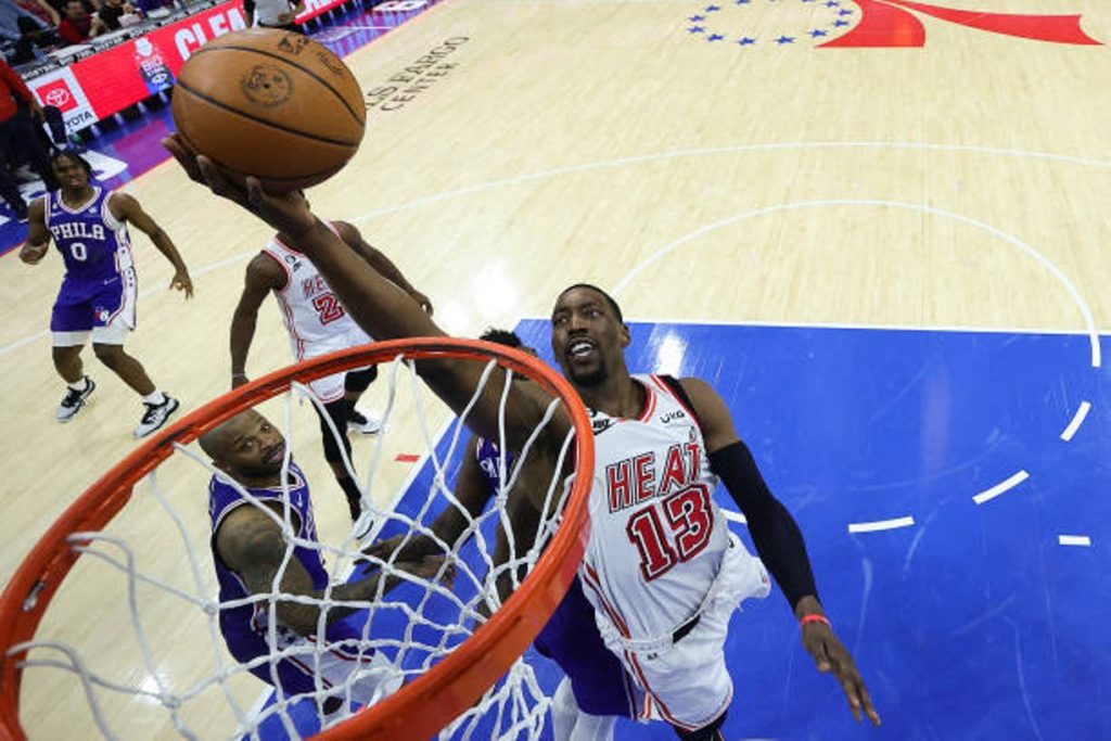 Butler's acrobatic jump, 23 points propel the Heat past the 76ers