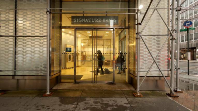New York Community Bank to buy failed Signature Bank