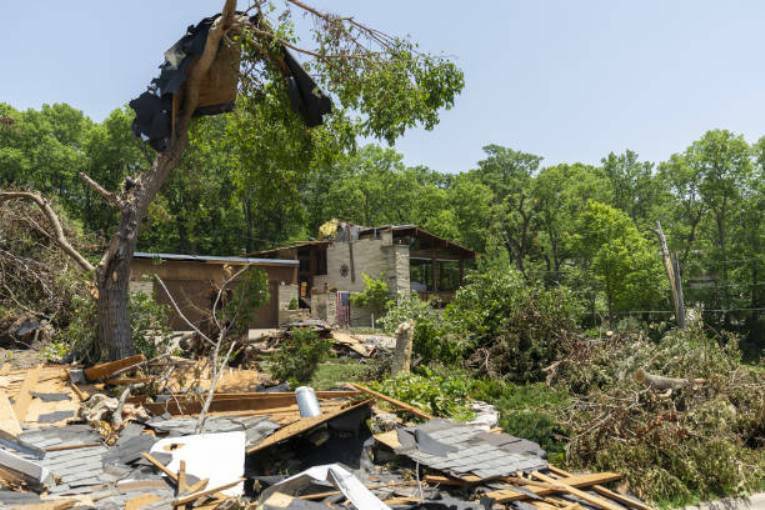 At least 7 people have died and dozens have been injured as tornadoes hit parts of the Midwest