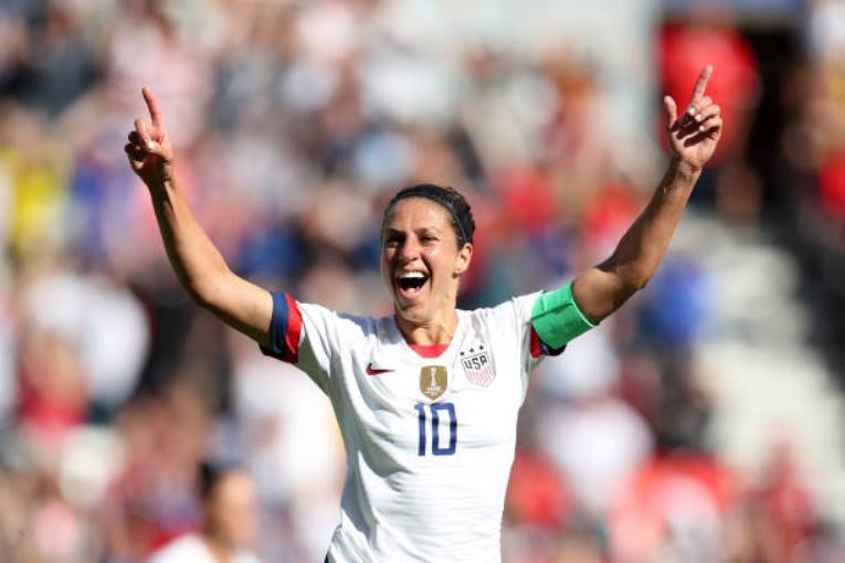 Carli Lloyd, a soccer star, criticizes the United States team for partying after their World Cup tie with Portugal