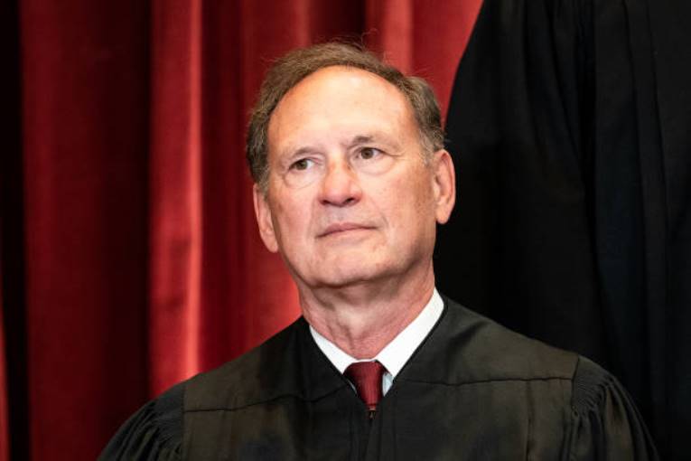 Samuel Alito won't withdraw from a case involving a lawyer who he spoke with on ethics for the WSJ